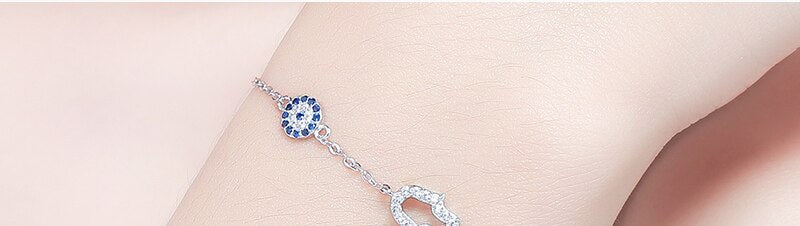 Sterling Silver Bracelet with Blue Evil Eye and Hamsa Hand